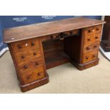A Victorian mahogany kneehole desk, the