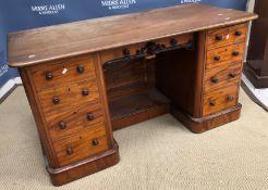 A Victorian mahogany kneehole desk, the