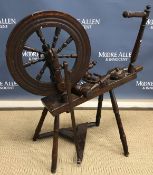 A Victorian fruit wood spinning wheel of
