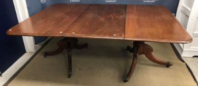 A late Regency mahogany dining table, th