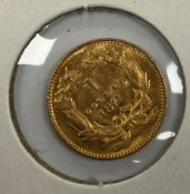 A USA gold $1 coin, 1874, feathered crow