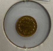 A United States gold $quarter coin, 1869
