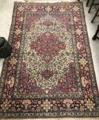 A vintage Persian rug, the central panel
