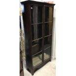 An Edwardian mahogany bookcase cabinet,