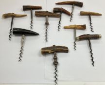 Nine various antler-handled T bar corksc
