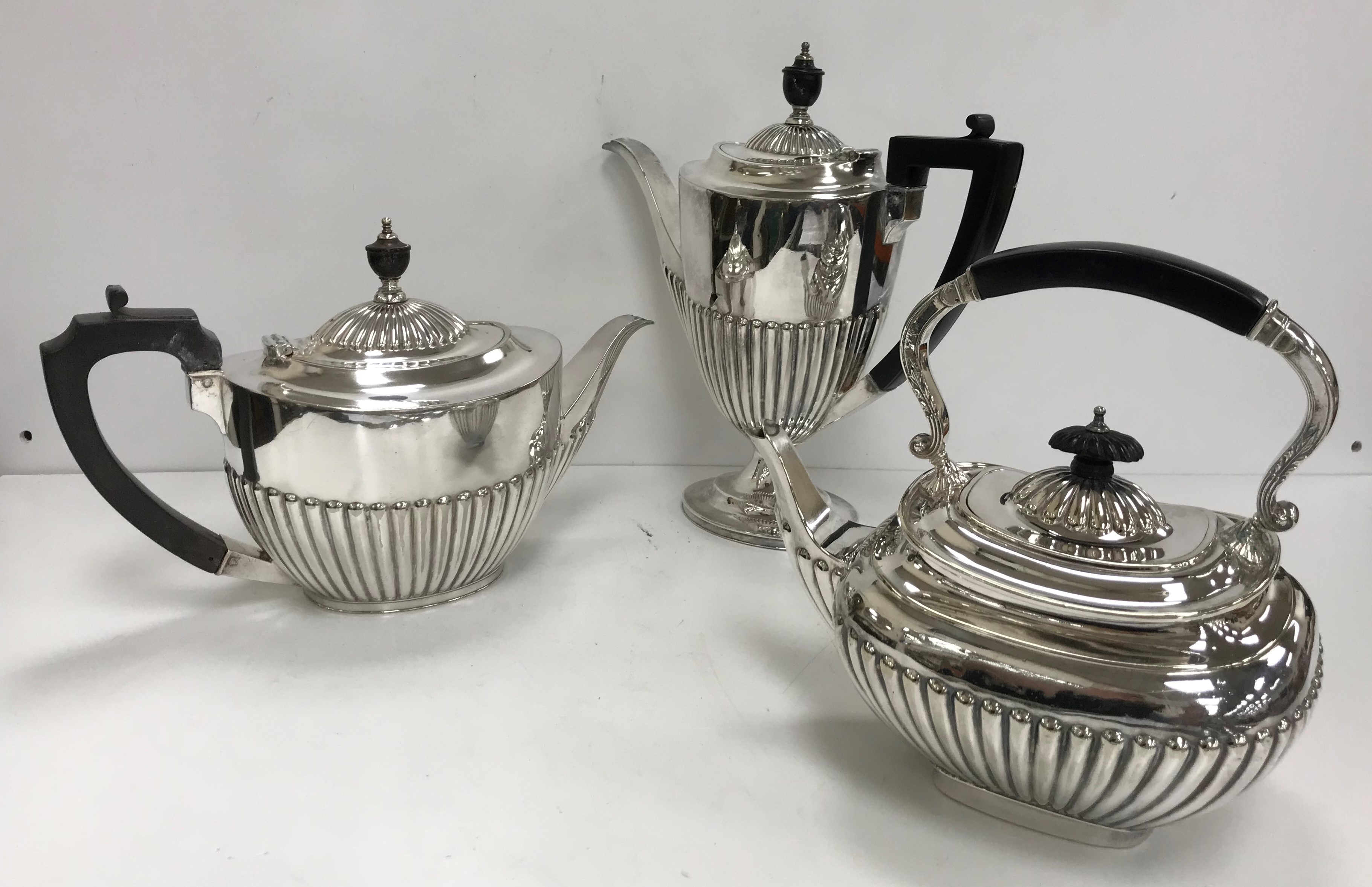 A pair of plated tea pot and coffee pot