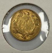 A United States gold $1 coin, 1853, feat