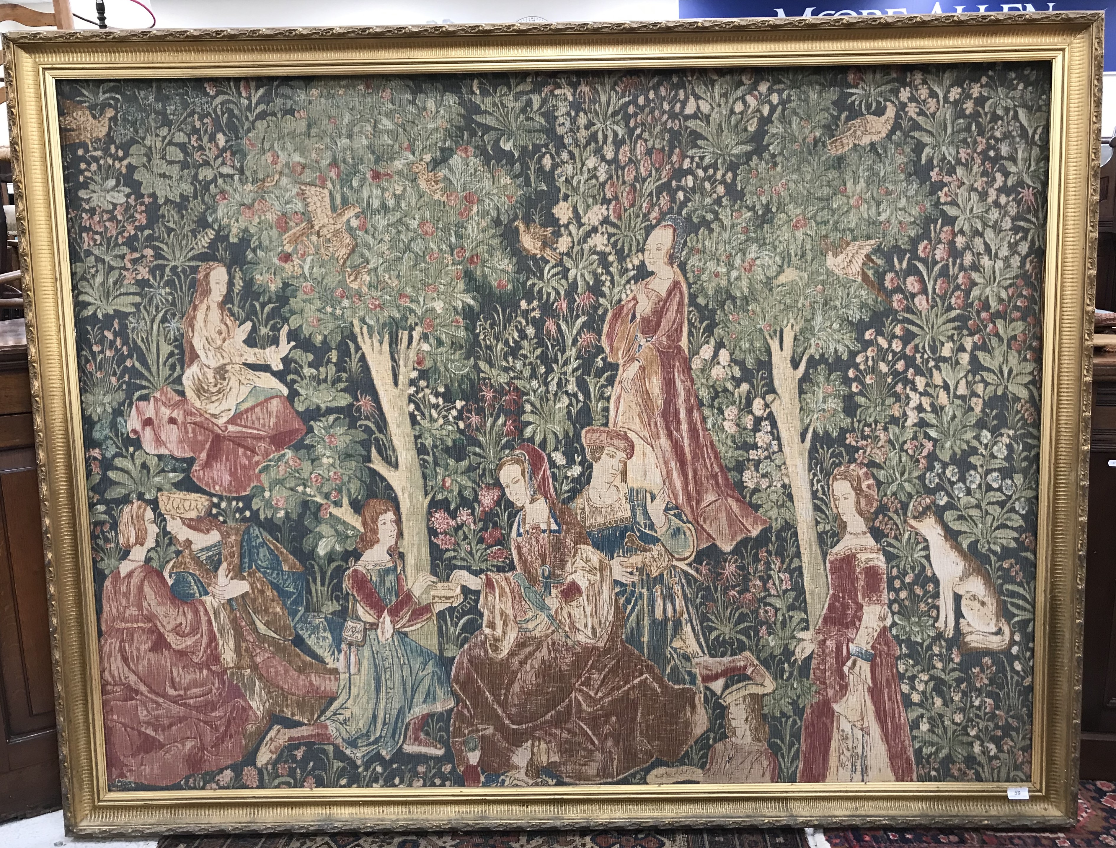 A large machine woven tapestry in the 17th Century manner depicting ''Couples in a garden amongst