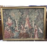 A large machine woven tapestry in the 17th Century manner depicting ''Couples in a garden amongst