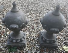 A pair of composite stone Victorian style orb gate finials/post finials with leaf and bead