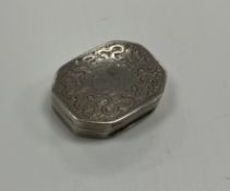 A George III silver vinaigrette of elongated octagonal form with wriggle work decorated lid