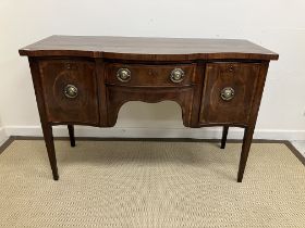 A 19th Century mahogany serpentine fronted sideboard of small proportions, the top with cross banded