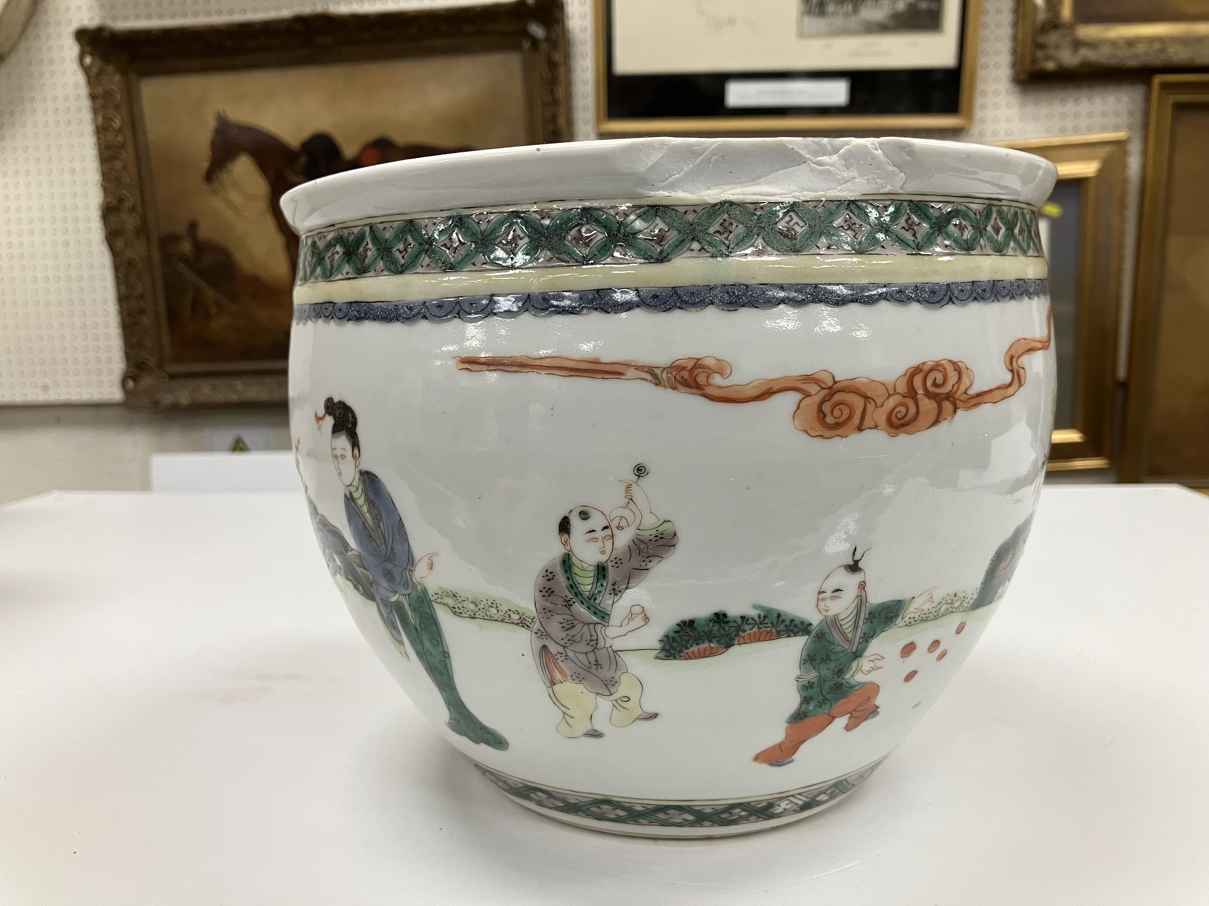 A 19th Century Chinese Kangxi palette jardiniere decorated with figures playing with various games - Image 23 of 26