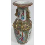 A 19th Century Chinese famille rose and giltwork embellished vase with flared rim and lion and