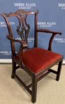 A 19th Century Chippendale design mahogany carver chair, the shaped back with pierced back splat