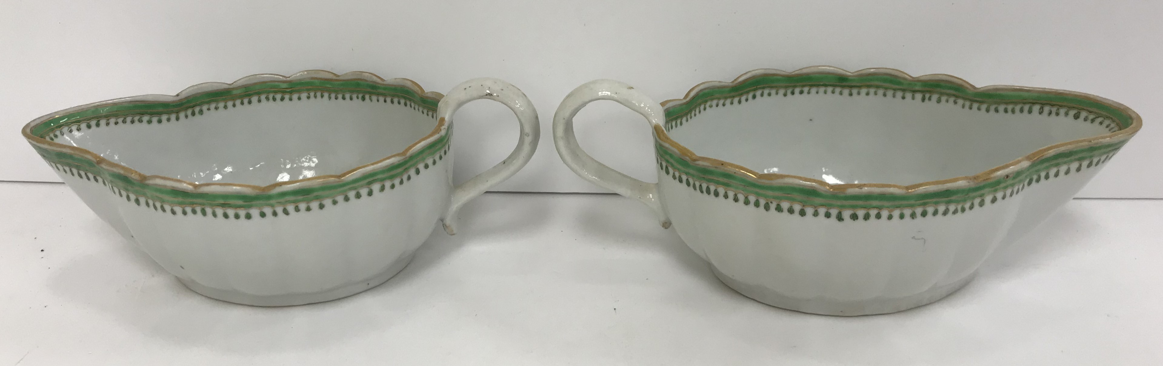 A pair of early 19th Century Chinese Export Way ware famille vert sauceboats of ribbed form with - Image 3 of 5