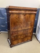 A 19th Century French walnut secretaire à abattant, the top over a cushion drawer and fall front