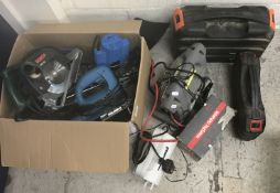 A collection of electrical hand tools to include a Powerbase router model No. 873980, a Powerbase