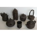 A collection of six Chinese Yi Xing tea pots various with various seal marks together with a Yi Xing