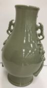 A Chinese celadon glazed vase bearing faux six character Chenghua (1465-87) mark to base, raised