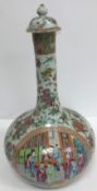 An early 19th Century Chinese famille rose gourd shaped vase and cover, the main body decorated with
