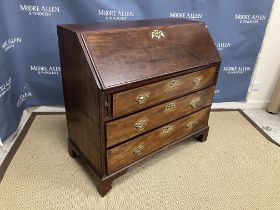 A 19th Century mahogany bureau, the plain top above a sloping fall enclosing a basic fitted interior