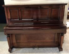 A mahogany cased upright piano, with ivo