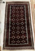 A Belouch tribal rug, the central panel