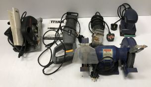 A collection of electric handtools to in