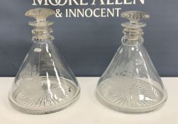 A pair of conical ship's decanters engra