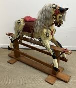 A Tri-ang style dappled rocking horse on