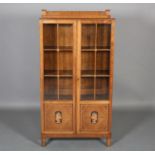 Bath Cabinet Makers - Gayladye c. 1920/30s, a walnut and glazed bookcase-cabinet in pearwood, ebony,