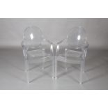 Phillipe Starck for Kartell, a pair of Louis Ghost armchairs, perspex, marked to rear seat rail