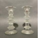 A pair of Whitefriars textured glass candlesticks, on circular bases, 18cm high