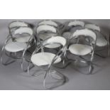 A set of eight Modernist tubular chrome framed chairs, originally designed in 1926, upholstered in