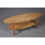 A 1970s ash two tier coffee table of oval outline with undertier, 116.5cm long x 40cm wide x 41.