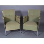 A pair of French tubular chrome and upholstered armchairs c. 1930s, in the style of Jean Prouvé