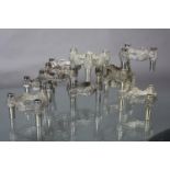 A white metal ten piece modular candleholder of abstract form, c.1960s