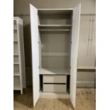 A modern two door wardrobe the interior fitted with shelf, hanging and two drawers 82cm wide x 203cm