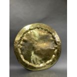 A large circular Beneres brass plaque or possibly table top for a folding table