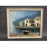 Monllor, Italian school, 20th century fishing village with beached boat, oil on board, 36.5cm by