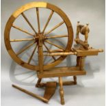 A modern pine spinning wheel