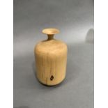 Studio produced turned willow flagon-shaped vase, signed DW to base, possibly David Wardingley, 12cm