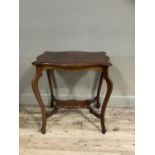 A polished and stained beech rectangular window table