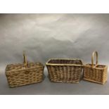 A wicker two bottle carrier, a wicker basket rectangular with hoop handle and a rectangular wicker