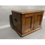 A late Victorian mahogany two door canteen chest fitted with five graduated drawers, brass