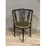 An Edwardian mahogany rail back open occasional chair