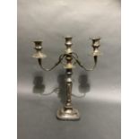 A plated on copper three light candelabra