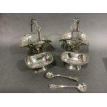 A pair of early 20th century silver baskets with clear glass liners etched with flowers and swags,