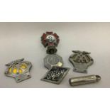 Various metal car badges including MG, Riley, The Order of The Road No.193237, two AA badges and a